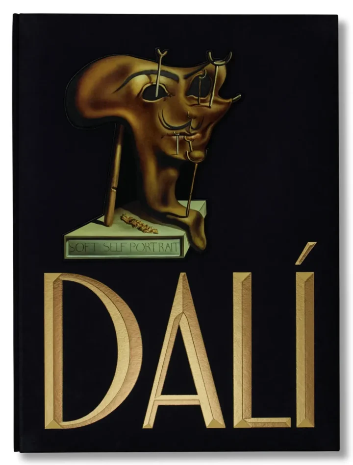 Salvador Dalí book cover of the Dali Bay Sumo edition with surreal Soft Self Portrait sculpture and gold title on black background